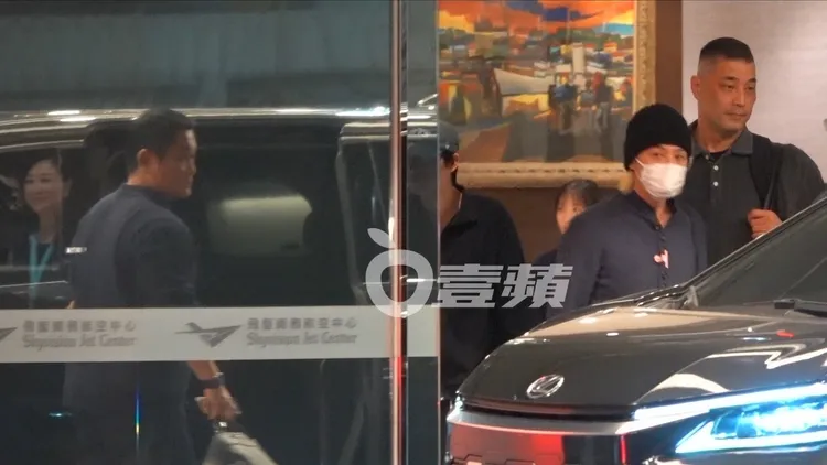 GD權志龍於晚間7點半，走出松山國際機場飛聖商務航空中心。特勤中心攝